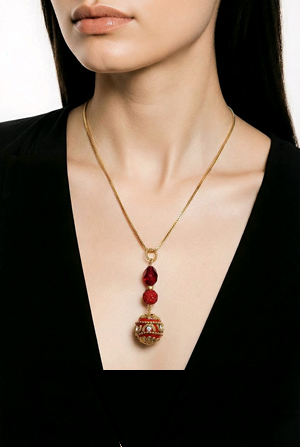 Red and gold sparkly beads on gold chain